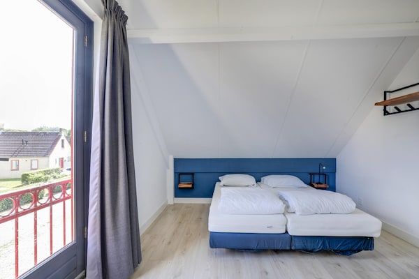 Slaapkamer - Retraite aan het meer met tuin in Ewijk in Ewijk (5)