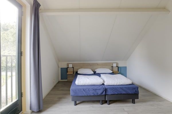 Slaapkamer - Rustig Ewijk Bosverblijf voor 4 personen in Ewijk (4)