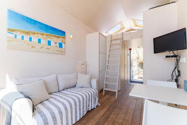 Woonkamer - Strandhuis met uitzicht op zee in Dishoek in Koudekerke (5)