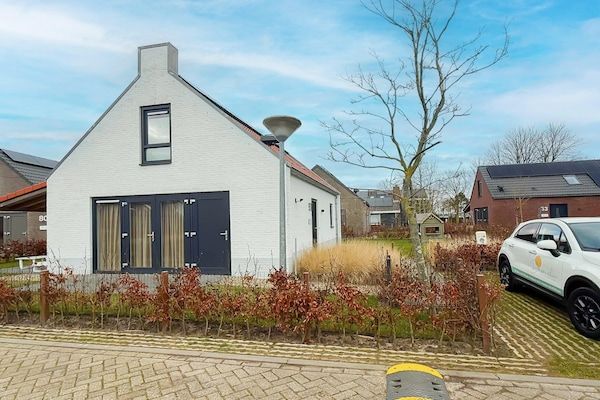 Buitenkant - Modern duinverblijf met tuin in Sint Maarten (1)