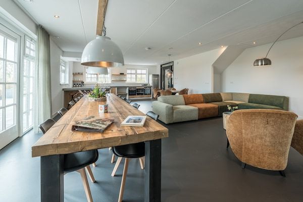 Eetkamer - Luxe villa met sauna voor 12 personen in Den Burg (3)