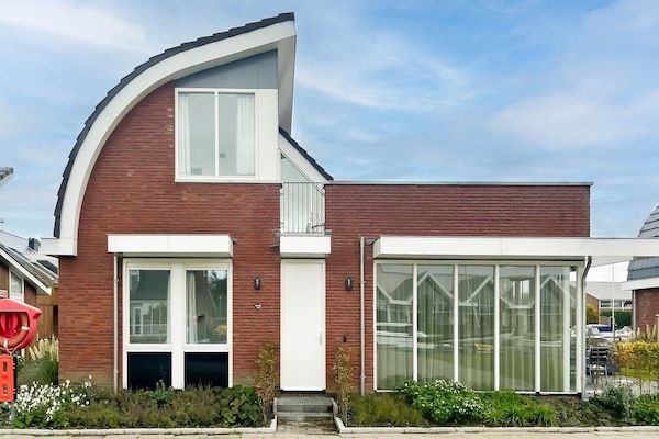 Buitenkant - Woning aan het water met terras voor 6 personen in Uitgeest (1)