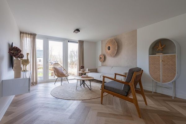 Woonkamer - Stijlvol huis aan de kust met tuin in Sint Maarten (3)