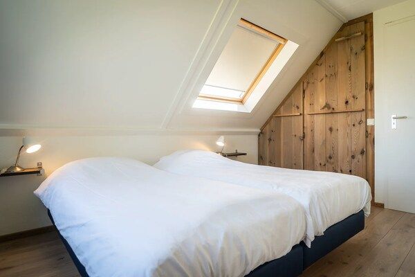 Slaapkamer - Vakantie op Texel met Whirlpool in De Koog (4)