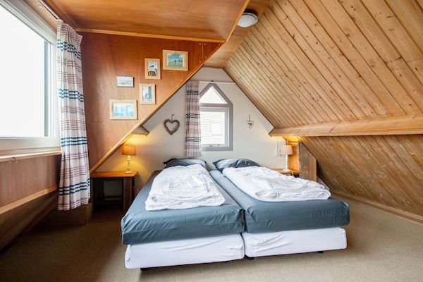 Slaapkamer - Huisdiervriendelijke woning vlakbij het strand in Callantsoog (5)