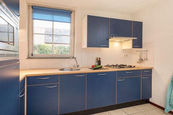 Keuken - Moderne bungalows vlakbij het strand in De Koog (3)