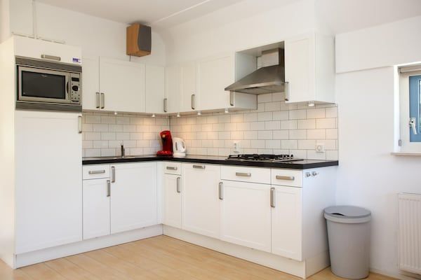 Keuken - Moderne bungalows aan zee in De Koog (4)