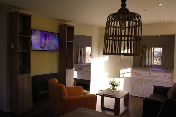 Woonkamer - Bosvilla in Herperduin met Bubbelbad in Herpen (3)
