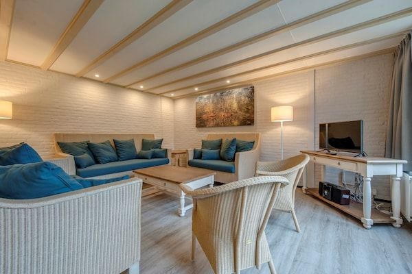 Woonkamer - Bungalow in Nederland met Tuinterras in Arcen (2)