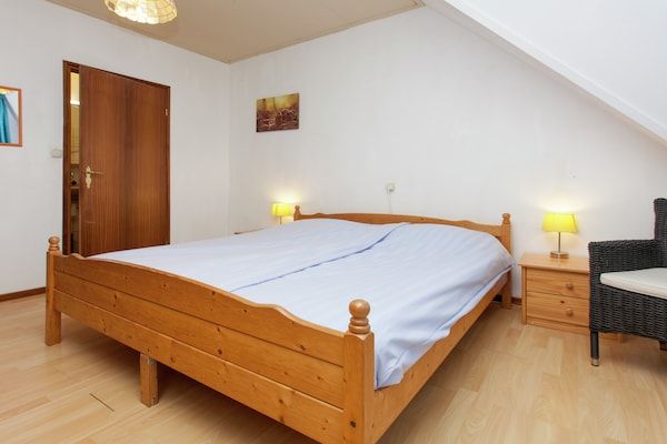 Slaapkamer - Boerderij in Holwerd bij de Zee in Holwerd (4)