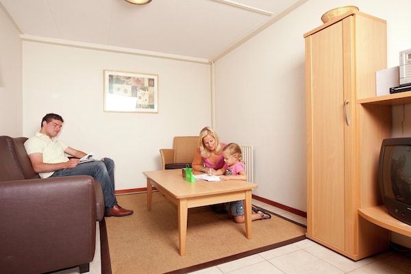 Woonkamer - Bungalow in Nederland met Privé Sauna in Kootwijk (1)