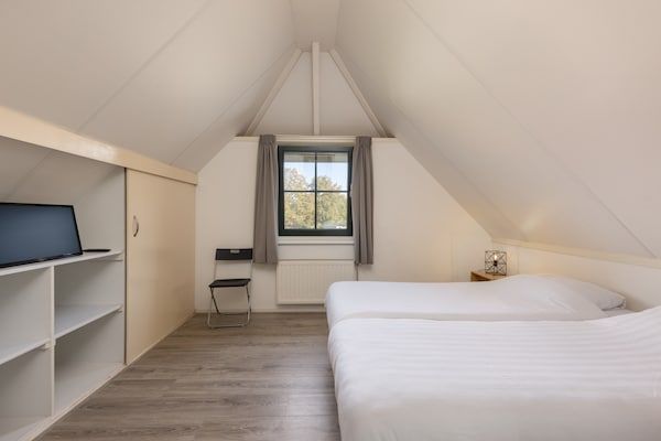 Slaapkamer - Vakantiehuis op park in Twente in Hoge Hexel (5)