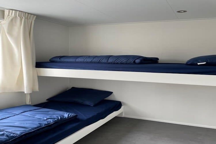 Een slaapkamer van Pavilion l'etage 44 in Kaatsheuvel