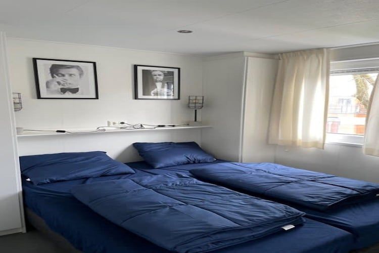 Een slaapkamer van Pavilion l'etage 44 in Kaatsheuvel